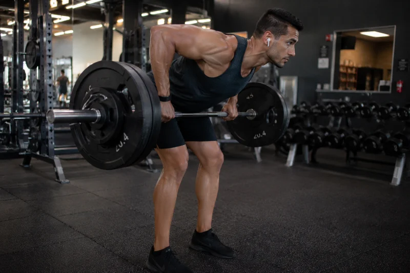Barbell row form during a back and tricep workout